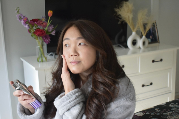 Christa Joanna Lee applying the Lancôme Rnergie H.C.F. Triple Serum